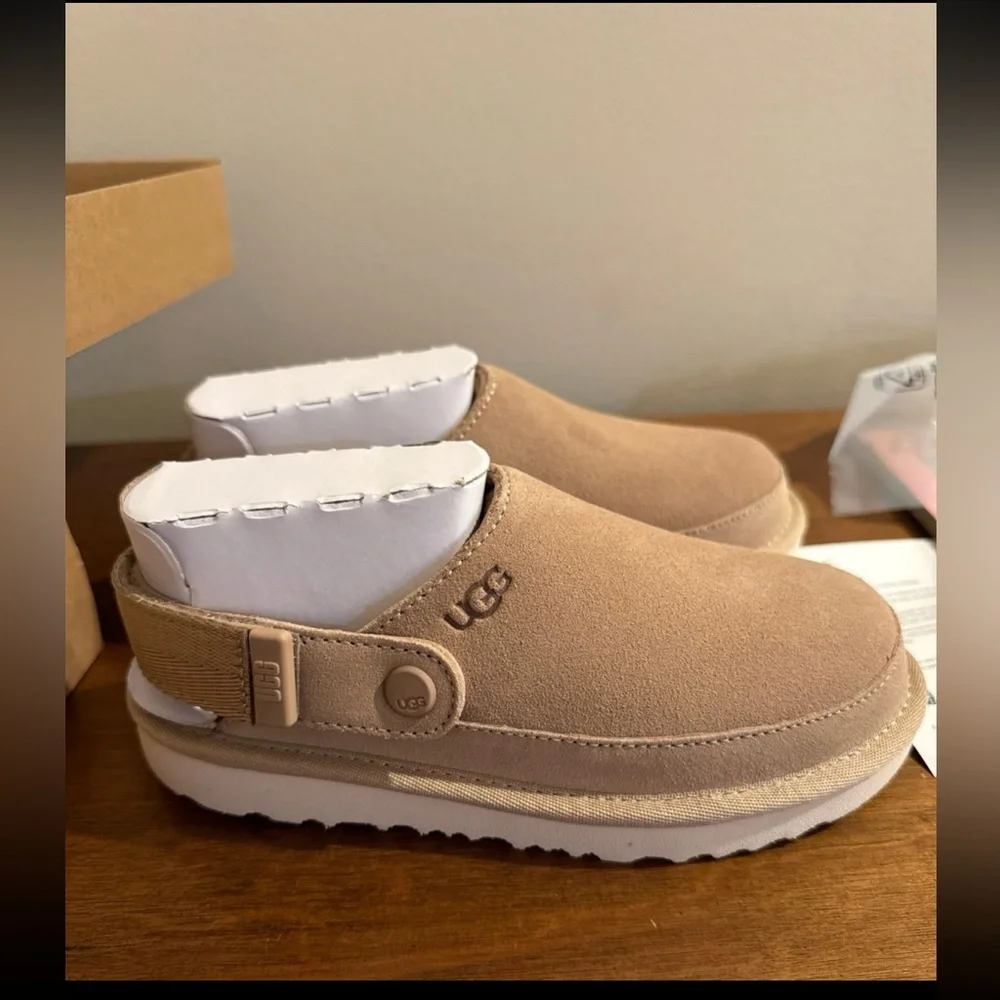 Brand new in box! UGG Kids Tan Slip-On Shoes
